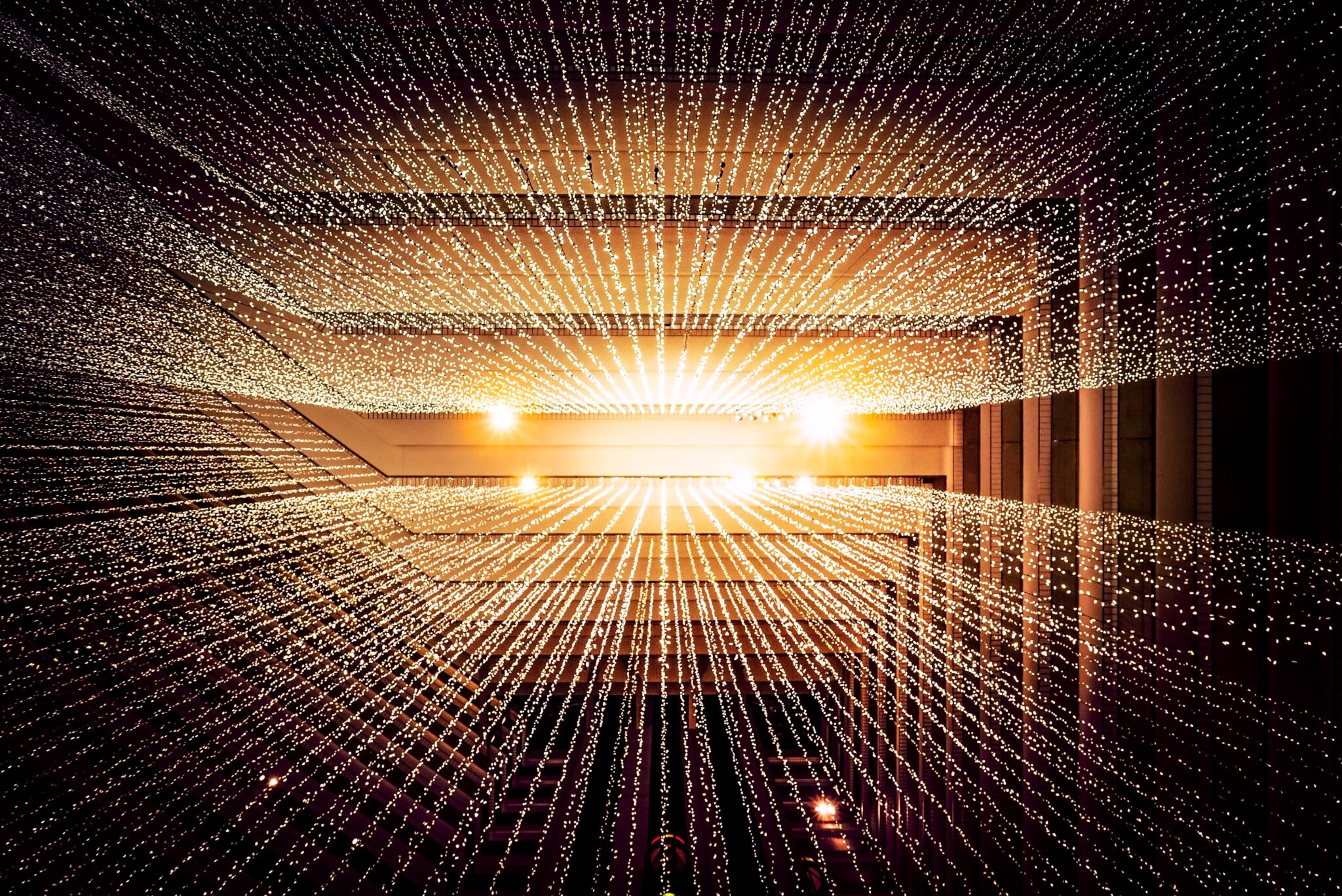 A hallway filled with light particles.