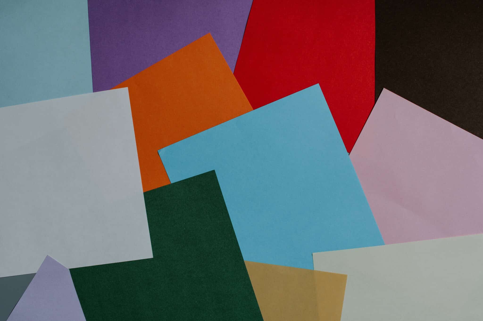 Different colored squares laying on a table
